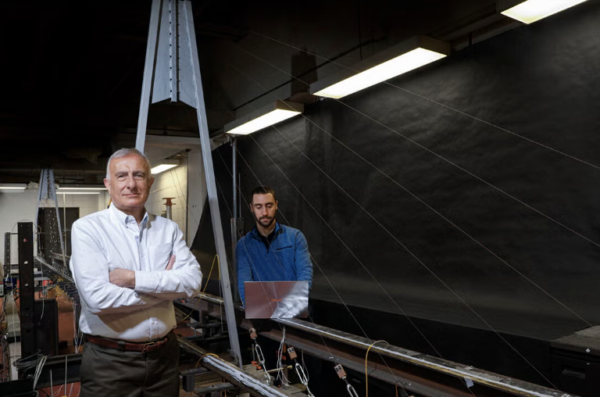 Faculty and students in a bridge lab